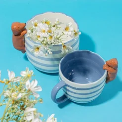 Mug peeking Sausage Dog